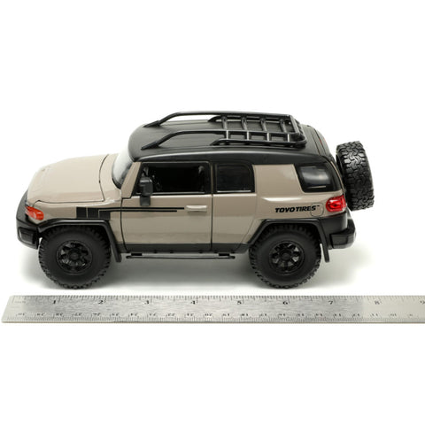 Just Trucks Toyota FJ Cruiser with Extra Wheels 1:24 Scale Diecast Model Toyo Tires Brown by Jada 34008
