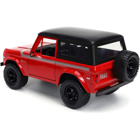 Just Trucks 1973 Ford Bronco Red with Black Top and Silver Stripe with Extra Wheels 1:24 Scale Diecast Model by Jada 32425