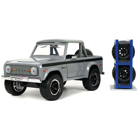 Just Trucks 1973 Ford Bronco with Extra Wheels 1:24 Scale Diecast Model Gray by Jada 33849