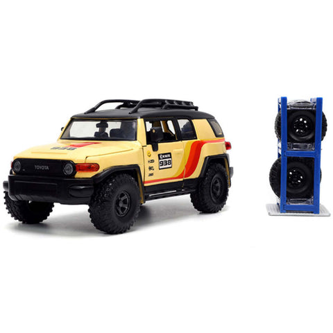 Just Trucks Toyota FJ Cruiser with Extra Wheels 1:24 Scale Diecast Model Yellow by Jada 33028